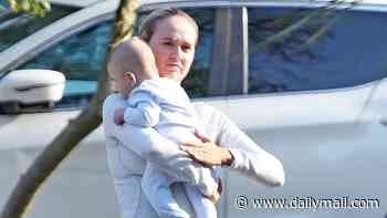 Molly Mae Hague cradles son Midas as she heads for a pub lunch with Tommy Fury after revealing she's battling 'mum guilt'