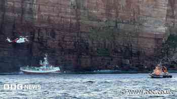 Seventeen rescued after fishing boat runs aground off Orkney