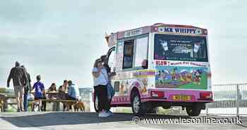 Crowds flock to the seaside for chips and ice-cream in the October sunshine