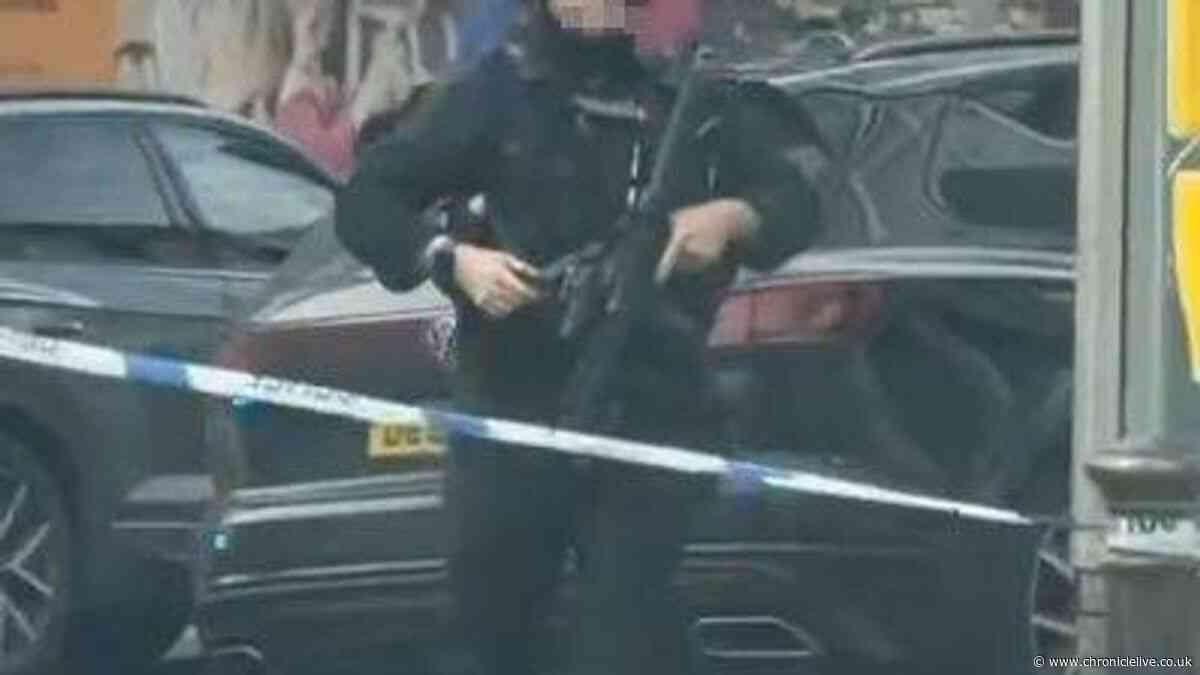 Manhunt underway as armed police discover dead dog in Blackpool house