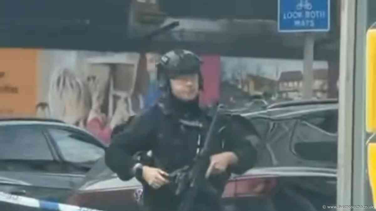 Manhunt underway after armed police descend on Blackpool street and find dead dog inside home