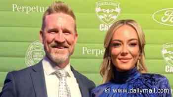 Nathan Buckley debuts glamorous new partner Kate Dickins at exclusive AFL event in Melbourne - after splitting with girlfriend Brodie Ryan