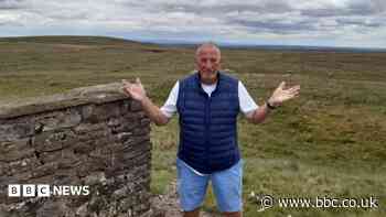 Cricket star Botham joins wind farm protest
