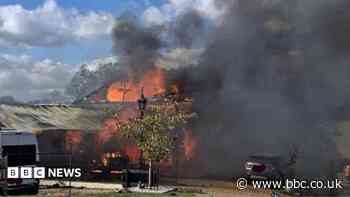 Garage fire destroys home, workshop and cars