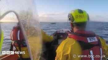 Causeway rescue after five people stranded in car