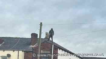 Hindley rooftop stand-off RECAP as police surround row of terraced houses