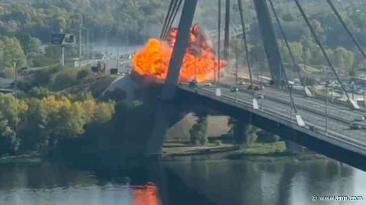 Russian drone hits Kyiv bridge as Germany's chancellor arrives to sirens and explosions