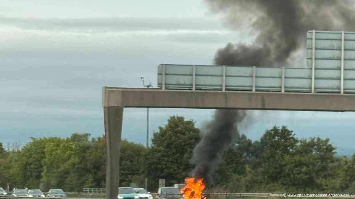 Lanes closed on M61 as firefighters tackle car blaze