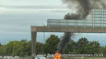 Lanes closed on M61 as firefighters tackle car blaze