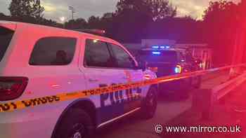Girl, 12, killed after two men 'opened fire' after parking space argument