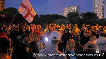 Protesters gather as migrant dinghy heads for south coast