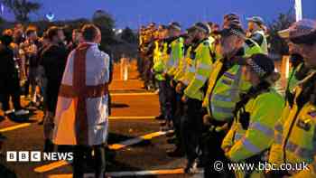 Protesters scuffle with police as migrants brought ashore on south coast