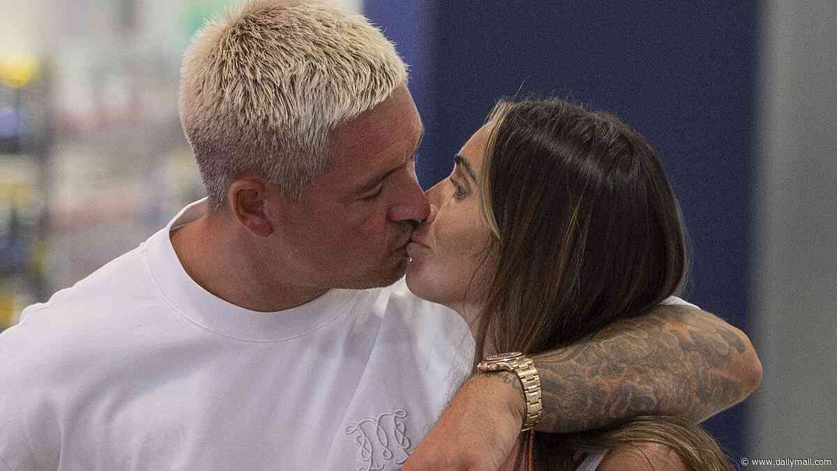 Amy Childs and Billy Delbosq share a kiss as they jet back to the UK after lavish second wedding in Marbella