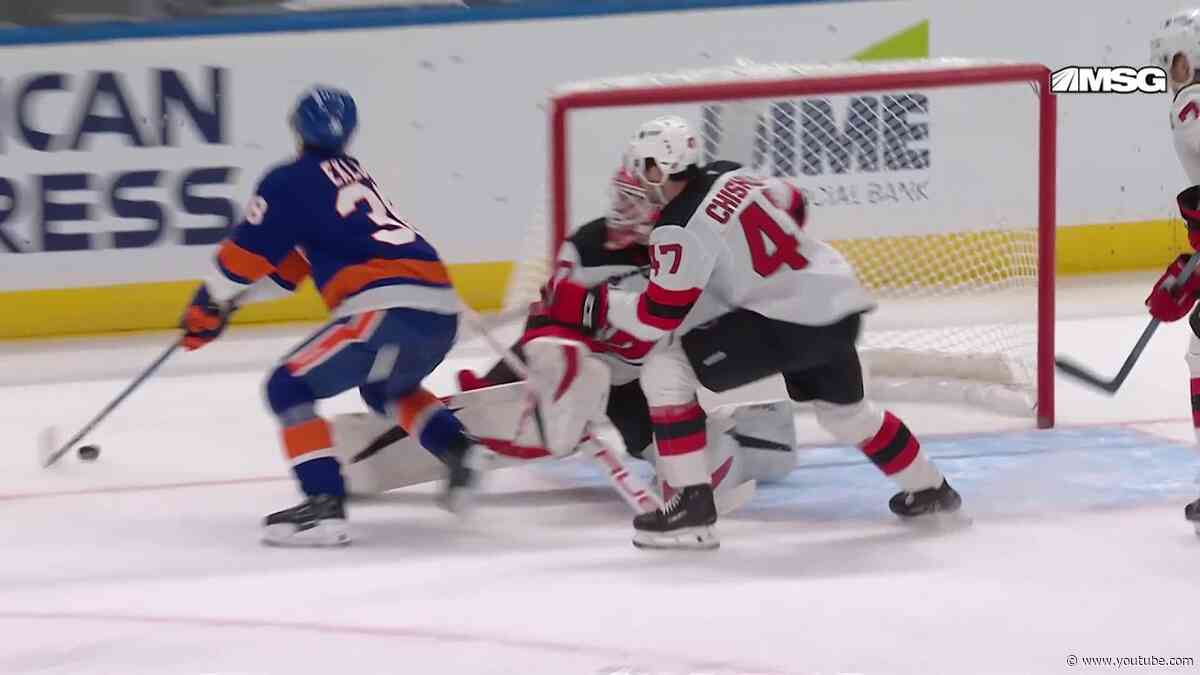 Brayden Schenn scores a goal against the New Jersey Devils