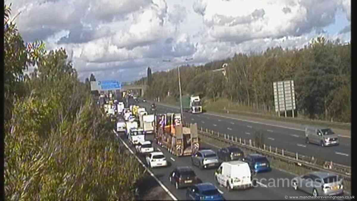 M60 traffic LIVE as long queues build amid reports of 'overturned vehicle'