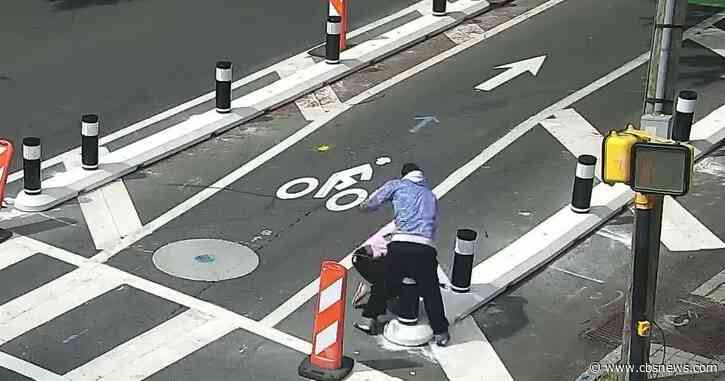 Police searching for suspect in brutal attack, robbery of woman at Midtown Atlanta crosswalk