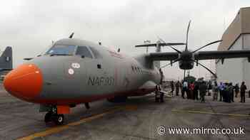 Military plane carrying 32 crashes in Nigeria as locals find 'body parts and shoes'