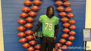 High school football star, 17, killed in shooting just weeks after committing to play for West Virginia as top recruit
