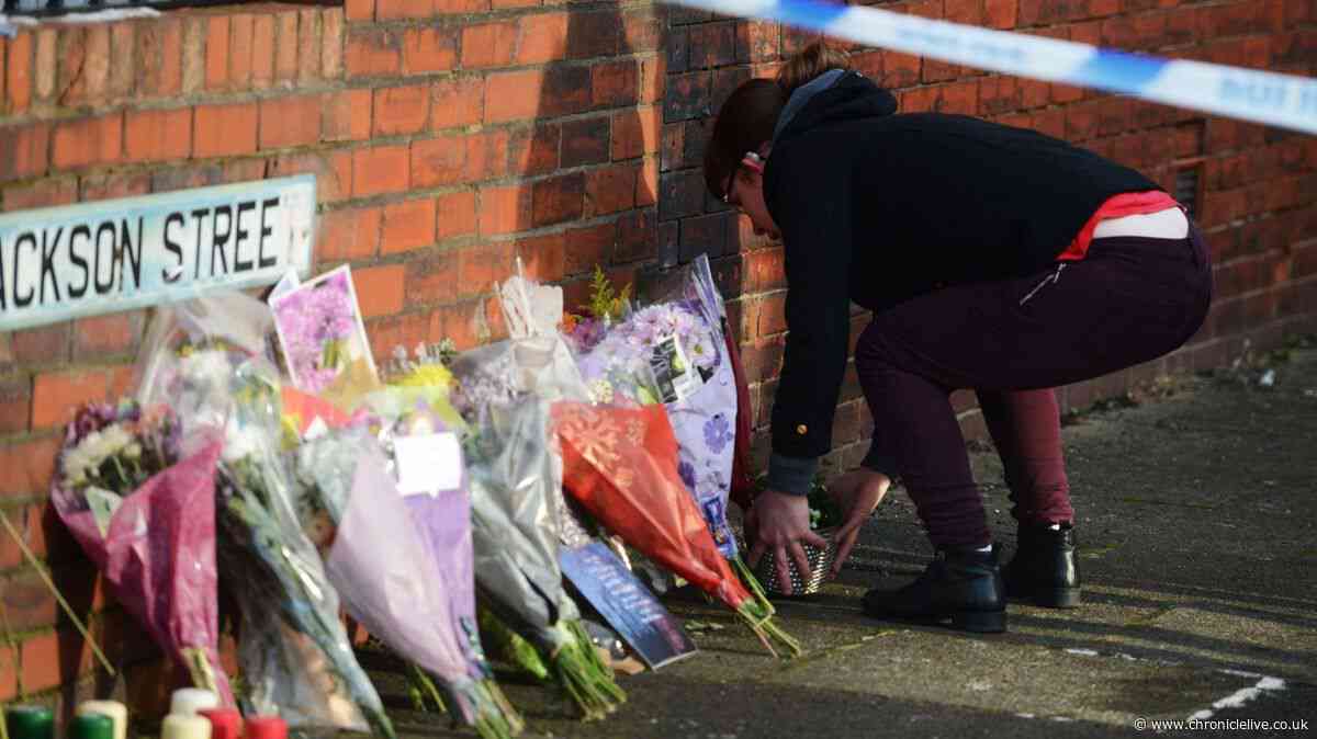 Mother died holding photo of four children killed in horrific  petrol bomb attack
