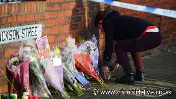 Mother died holding photo of four children killed in horrific  petrol bomb attack