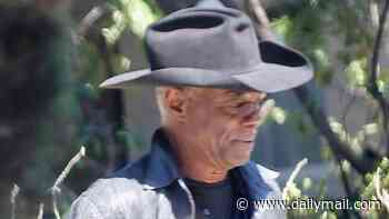 Hollywood icon and cowboy champion, 79, who was married to Aretha Franklin makes rare outing in LA... can you guess who?