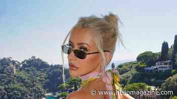 Braless Christina Aguilera, 45, flaunts curves in daring low-cut dress on romantic Italy vacation with fiancé