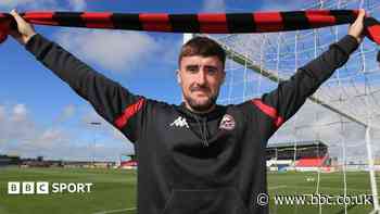 Defender Dean signs new Truro City contract