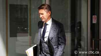 High-flying lawyer goes on trial for writing bad cheque allegedly to cover for collapsing firm