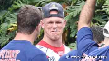 A ciggie, a beer and a historic premiership win: Roosters stars let loose after grand final: See the pictures