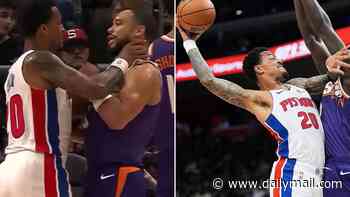 Ill-tempered NBA preseason game explodes into violence as player grabs rival by the throat