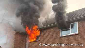 Smoke fills air as firefighters tackle Cambridge house fire