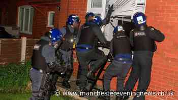 Drama in Stretford as police smash through window and arrest teen in dawn raids