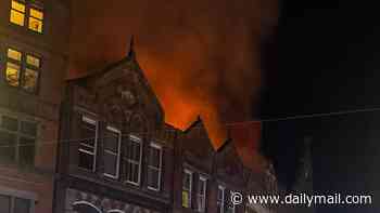 Fire rips through building in Nottingham city centre: Two boys arrested on suspicion of arson