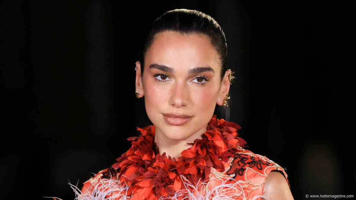 Dua Lipa shows off supermodel-worthy legs in most daring thigh-high slit dress