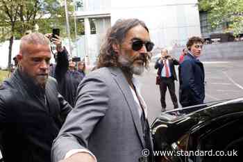 Russell Brand says 'God bless you' as he leaves court ahead of start of rape trial