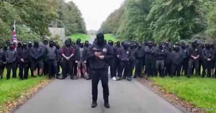 Police break up 100 masked ‘patriots’ delivering anti-migrant message to PM in front of Lancashire estate