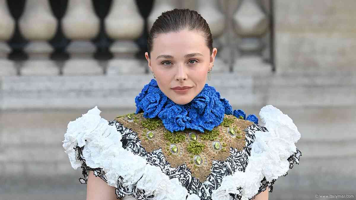 Chloë Grace Moretz turns heads in a Gilded Age-inspired collar crop top as she joins Emma Stone and Zendaya at the Louis Vuitton show during Paris Fashion Week