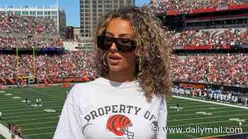 Gia Duddy and her NFL star boyfriend embroiled in ugly social media spat with troll as pair appear to finally confirm romance