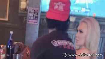 Moment Bunnie XO's 'facade' drops as she snogs boytoy reality star