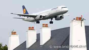 Passenger 'tries to open plane door' mid-flight before dramatic restraint by crew