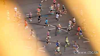 Fitness influencer apologizes after hitching a bike ride in the Berlin Marathon