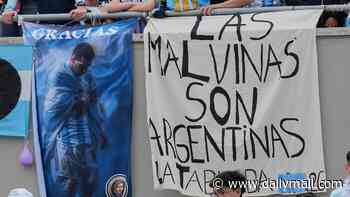 Argentina fans display 'Malvinas' banner laying claim to the Falkland Islands in the stands at Lionel Messi's emotional farewell match