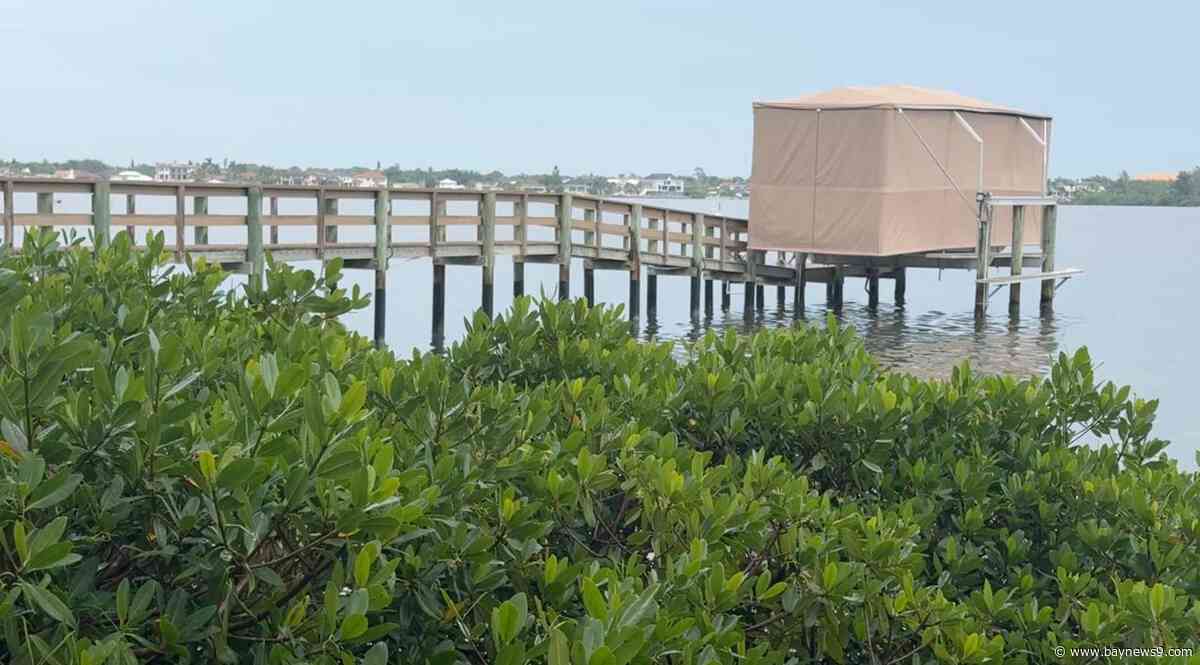 Residents, boaters debate use of enclosed boat slips in Little Sarasota Bay