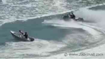 Shocking moment Aussie teen jet ski riders allegedly capsize tinnie carrying two young boys as police warn of possible charges