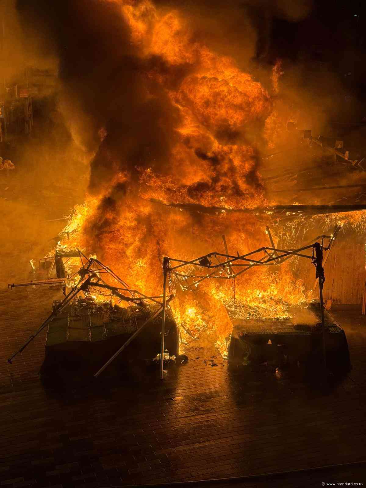 Moment inferno rips through historic Kingston Market as locals 'woken by heat'