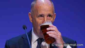 Living the dream! Tory chairman enjoys morning pint of warm beer alongside a labrador after Labour minister's 'Far Right' attack on country life