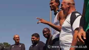 7ft 4in giant turns up at team's rugby training as players and viewers in awe
