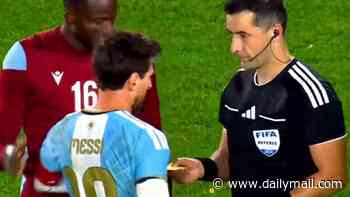 Bizarre moment Lionel Messi is handed a surprising gift by referee at the end of his emotional Argentina farewell