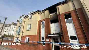 Fire at flats being treated as possible arson