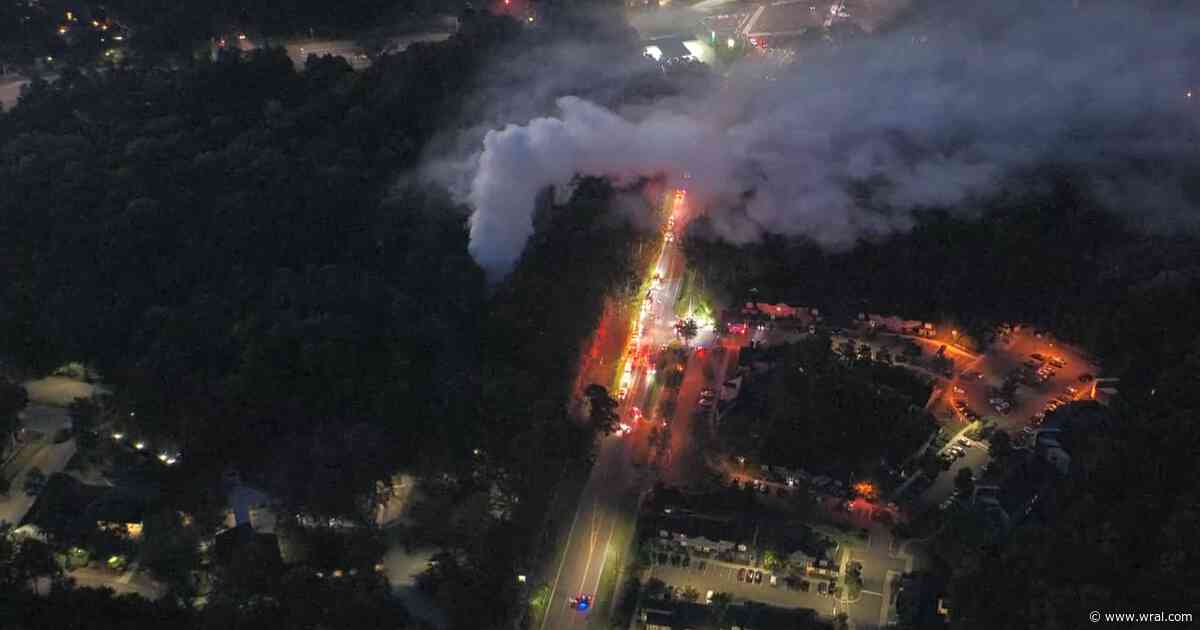 Firefighter injured in Durham house fire on Garrett Road